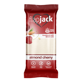 Flapjack Meggyízű mandulás zabszelet kandírozott cseresznyedarabokkal, fehér bevonóba mártva 100 g